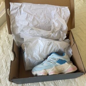 Brand new New Balance kids sneakers, size 5T. Never worn.